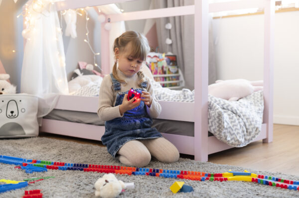 child playing in her room